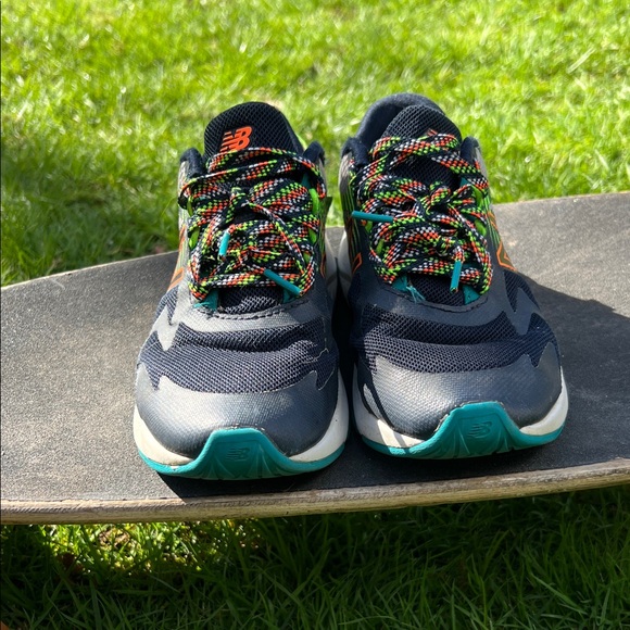 Kid’s New Balance Navy and Neon Athletic Shoes - Picture 2 of 6